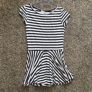 Black and white striped top with a peplum bottom